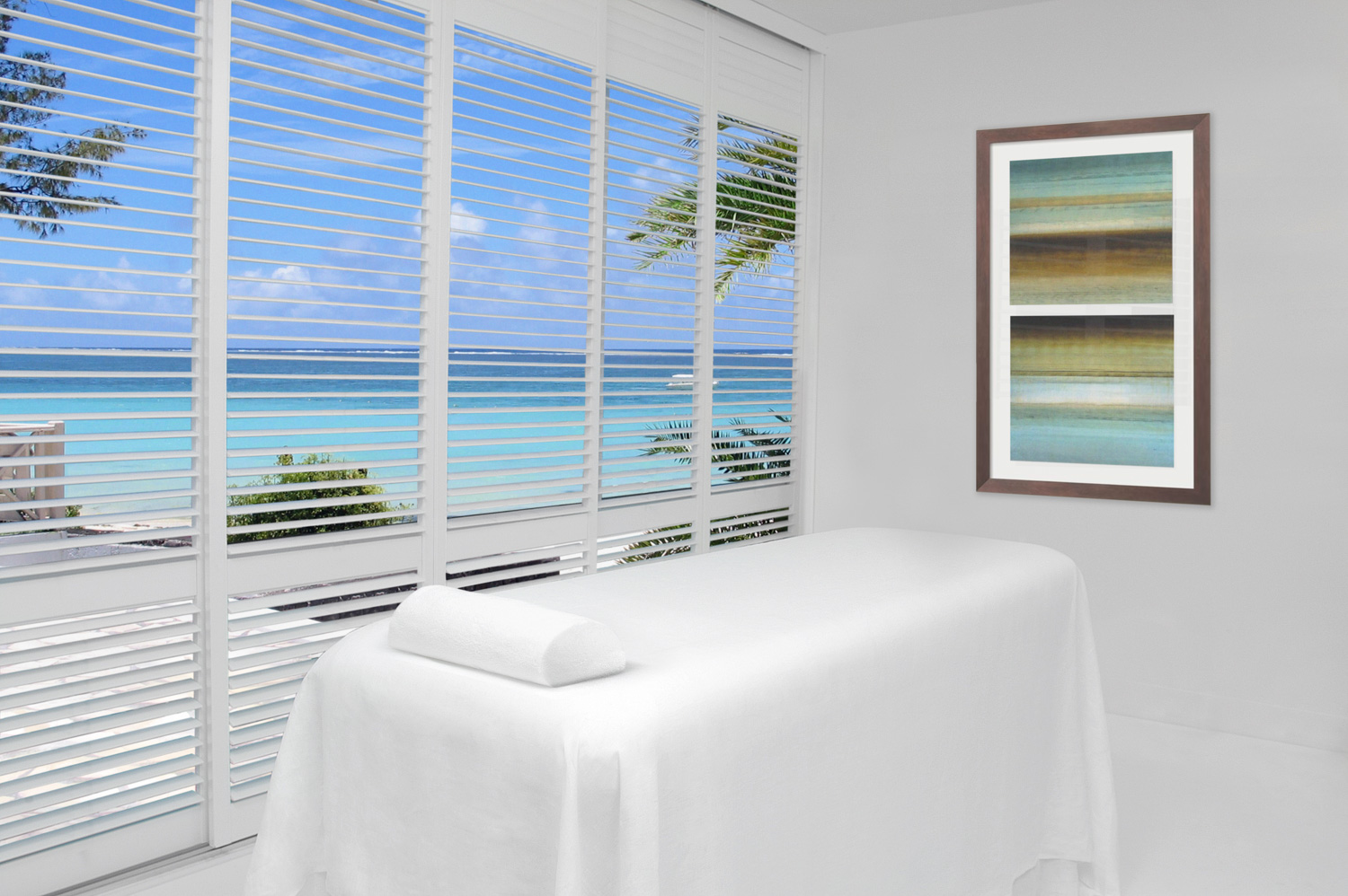 Tranquil massage room with ocean view, enhanced by composite shutters for privacy and ambiance.