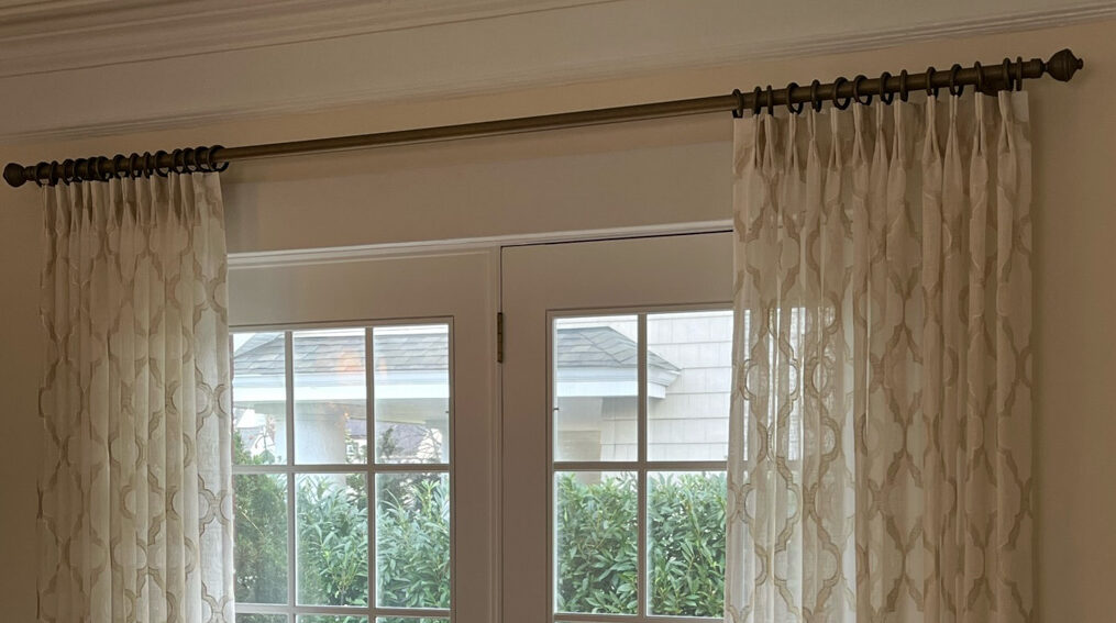 Monarch pleat style drapes, showcasing a refined design with crisp, structured pleats for a timeless appeal.